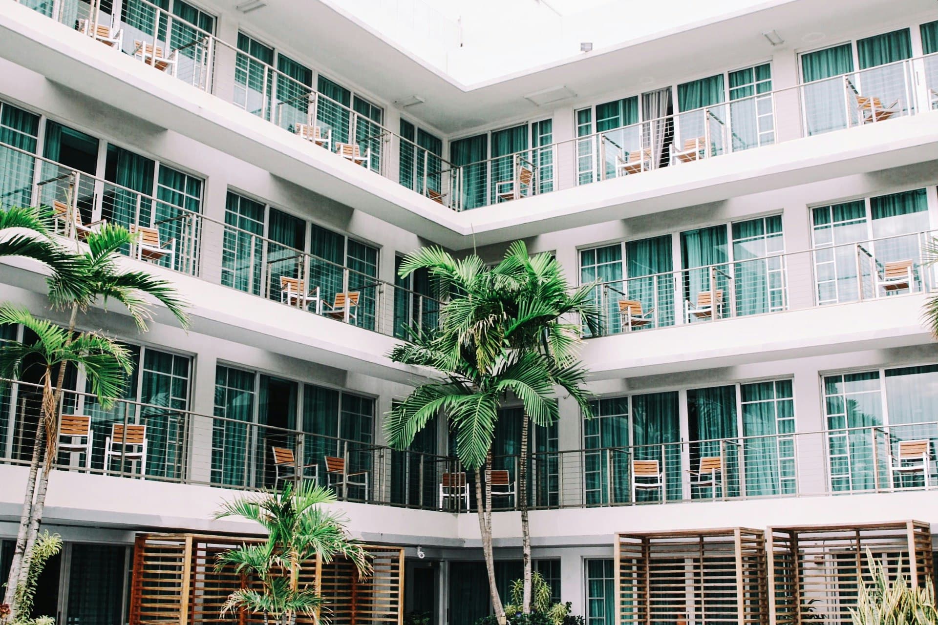 Hotel exterior near a convention district during active business travel hours